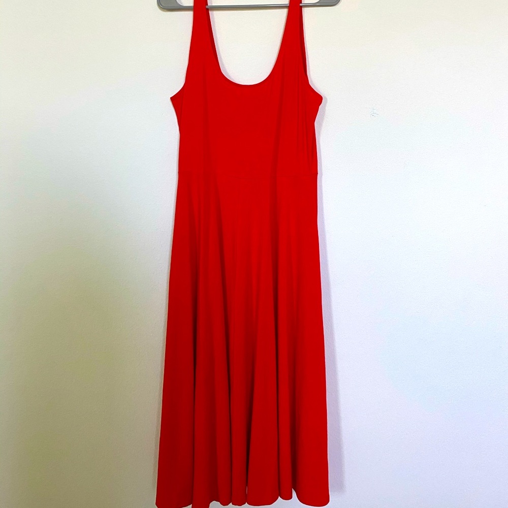 Orange or red knit sundress.